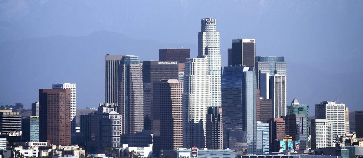 Image of LA skyline, representing the companies that do business in California and how the shifting sands of employment law require a results-oriented, accessible and reliable California employer defense law firm like the Law Offices of Susan A. Rodriguez, APC.