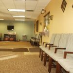Image of a medical office waiting room, representing how The Law Offices of Susan A. Rodriguez, APC help employers understand and comply with laws on paid sick leave in California.